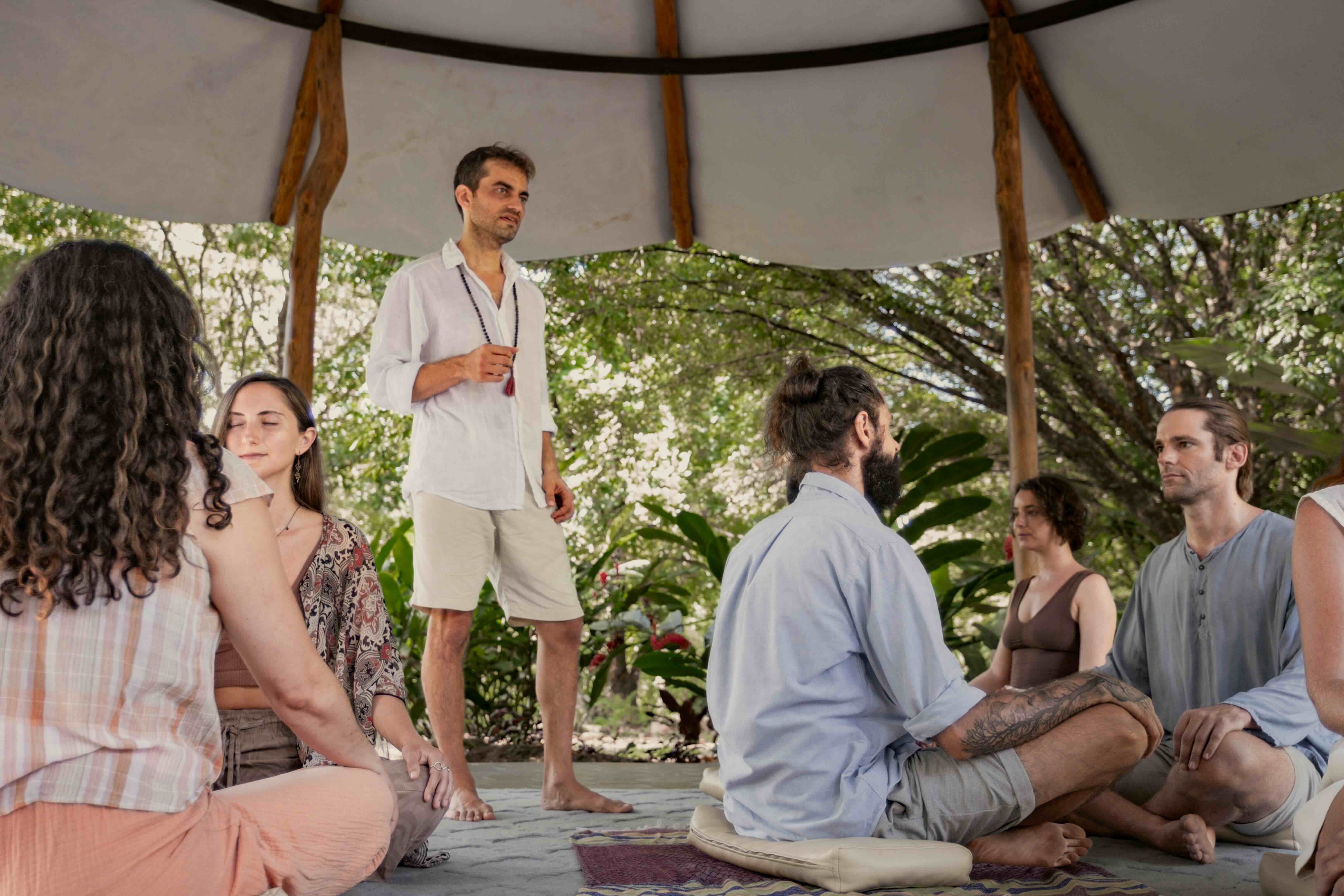 David leading an Innerview session in a circle of participants